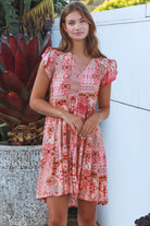 Camilla boho mini dress in rayon with button front empire waist flutter sleeves and tiered skirt Australian fashion