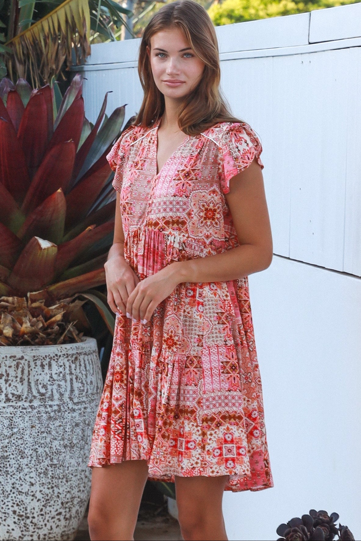 Camilla boho mini dress in rayon with button front empire waist flutter sleeves and tiered skirt Australian fashion