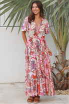 Pink paisley bohemian maxi dress with flutter sleeves, drawstring waist and tiered hem in softly draped rayon. Boho Dresses Australia.
