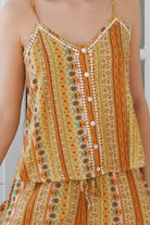 Amara rayon slip top by Dreamcatcher with multicoloured boho stripe print, adjustable straps and white cotton lace trim.