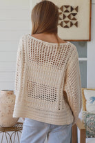 Cream crochet knit sweater with open weave relaxed fit boho top Australia styled with light wash denim jeans