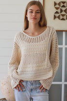 Cream crochet knit sweater with open weave relaxed fit boho top Australia styled with light wash denim jeans
