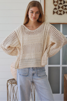 Cream crochet knit sweater with open weave relaxed fit boho top Australia styled with light wash denim jeans