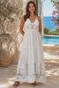 Model in motion wearing the Alexandra white embroidered cotton maxi dress with tiered skirt | Shop Bohemian Love Runway Australia