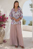 Model in motion wearing the Primrose pink floral rayon blouse by Charlotte The Label | Shop Bohemian Love Runway