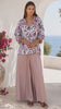 Model in motion wearing the Primrose blouse pink and Esme blush pink wide leg rayon pants by Charlotte The Label | Bohemian Love Runway