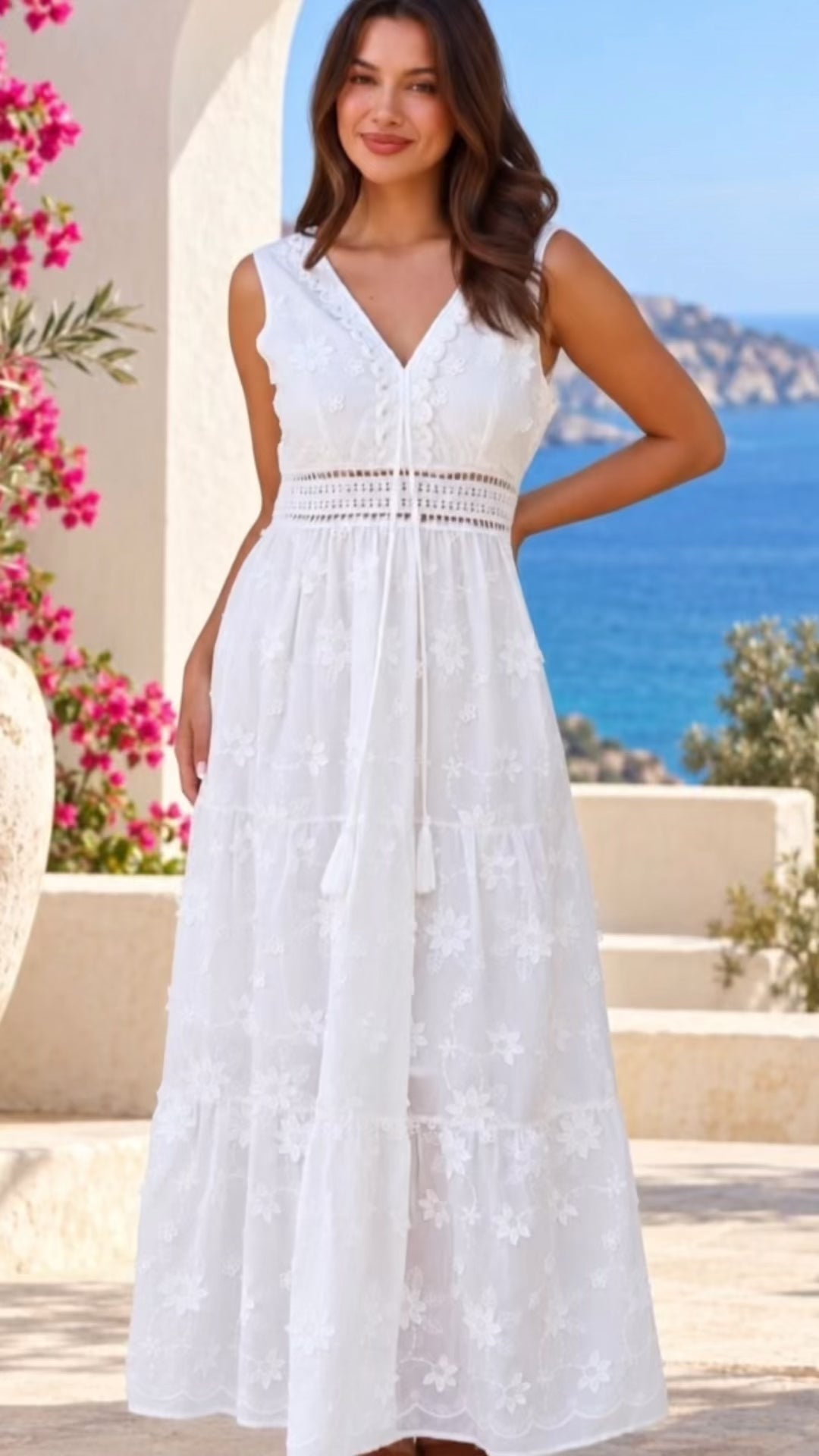 Model in motion wearing the Demi white embroidered cotton boho maxi dress with crochet lace by Salty Palm at Bohemian Love Runway