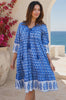 Model in motion wearing the Dahlia Blue Cotton Boho Mini Dress from Bohemian Love Runway.