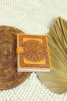  Journals Australia - hand tooled mandala leather journal in golden tan with vintage clasp and cotton paper.